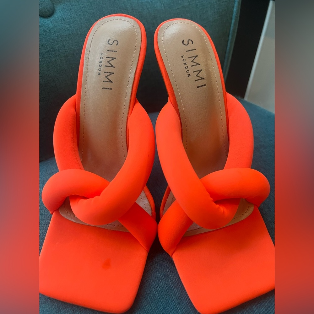 Neon orange stiletto high heels